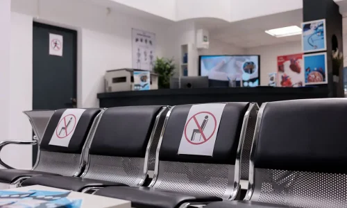 empty-waiting-room-chairs-in-hospital-reception-2025-02-19-20-51-32-utc